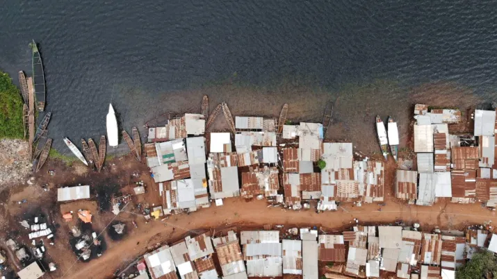 Aerial view of waterfront village in Uganda